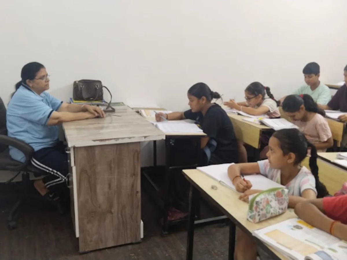 Students studying in a classroom at Nipun Coaching, Sadiq Nagar